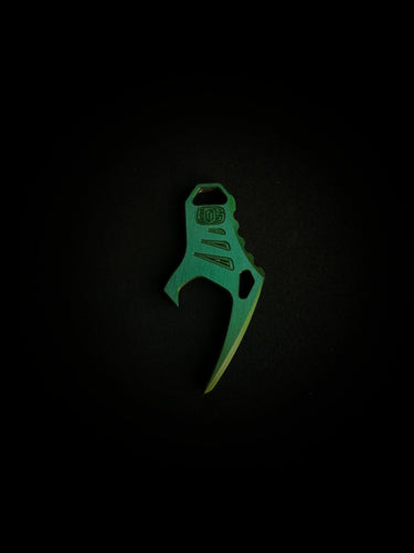 dark green anodized aluminum cap lifter