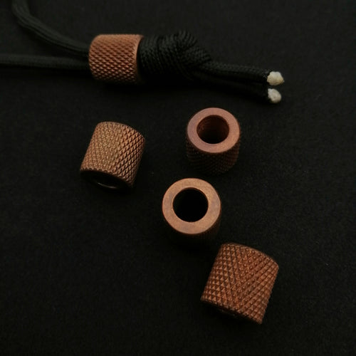 checkered copper lanyard bead (copper- hand made by PVB knives)